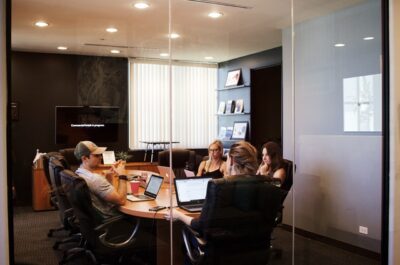 young adult in office board room